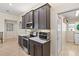 Modern kitchen with stainless steel appliances and ample counter space at 45 Marker Rd, Rotonda West, FL 33947