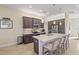 Modern kitchen with an island and stainless steel appliances at 45 Marker Rd, Rotonda West, FL 33947