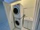 Stackable washer and dryer, utility sink in closet at 4530 Turnberry Cir, North Port, FL 34288