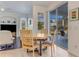 Bright dining area with sliding glass doors leading to the backyard at 4607 Sabrina Ter, North Port, FL 34286