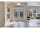 Bright entryway with double doors and decorative niche at 4607 Sabrina Ter, North Port, FL 34286