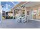 Bright and airy screened patio with seating area at 4607 Sabrina Ter, North Port, FL 34286