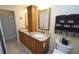 Bright bathroom featuring double sinks and updated fixtures at 506 Monaco Dr, Punta Gorda, FL 33950