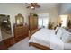 Luxurious Primary bedroom, featuring hardwood floors and a king-size bed at 506 Monaco Dr, Punta Gorda, FL 33950