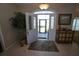 Open entryway with view into living room and backyard at 506 Monaco Dr, Punta Gorda, FL 33950