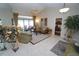 Living room with access to a bedroom and backyard view at 506 Monaco Dr, Punta Gorda, FL 33950