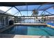 Inviting screened pool with tranquil canal views at 506 Monaco Dr, Punta Gorda, FL 33950