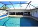 Large, refreshing pool with a screened enclosure at 506 Monaco Dr, Punta Gorda, FL 33950