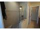 Spa-like shower with glass enclosure and built-in seat at 506 Monaco Dr, Punta Gorda, FL 33950