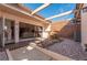 Inviting courtyard with a water feature and seating area at 5089 San Rocco Ct, Punta Gorda, FL 33950