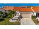 Front exterior view of villa with attached garage at 5089 San Rocco Ct, Punta Gorda, FL 33950