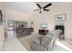 Spacious living room with vaulted ceilings and comfortable seating at 5089 San Rocco Ct, Punta Gorda, FL 33950