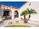 Relaxing patio with pergola, seating area, and lush landscaping at 5089 San Rocco Ct, Punta Gorda, FL 33950