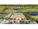 Resort-style amenities including pool, tennis courts, and clubhouse at 5625 Whispering Oaks Dr, North Port, FL 34287