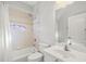 Bathroom with tub, shower, and vanity at 5625 Whispering Oaks Dr, North Port, FL 34287