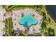 Overhead view of a refreshing community pool at 5625 Whispering Oaks Dr, North Port, FL 34287