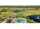 Relaxing community pool with lounge chairs at 5625 Whispering Oaks Dr, North Port, FL 34287