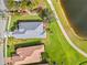 Aerial view of two homes near a pond at 5752 Whispering Oaks Dr., North Port, FL 34287