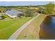 Aerial view of home and walkway near pond at 5752 Whispering Oaks Dr., North Port, FL 34287