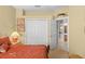 Bedroom with a double bed and an ensuite bathroom at 5752 Whispering Oaks Dr., North Port, FL 34287