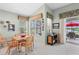 Kitchen dining area with table and chairs, offering a view of the golf course at 5752 Whispering Oaks Dr., North Port, FL 34287