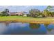 House with scenic pond and golf course views at 5752 Whispering Oaks Dr., North Port, FL 34287