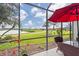 Enjoy the view from this screened patio at 5752 Whispering Oaks Dr., North Port, FL 34287