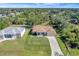 Aerial view of two-house property with ample yard space at 6174 Alloway St, Englewood, FL 34224