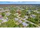 Aerial view showcasing the home's location in a residential neighborhood at 6174 Alloway St, Englewood, FL 34224