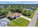 Aerial view of house, driveway, and surrounding area at 6174 Alloway St, Englewood, FL 34224