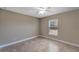 Spacious bedroom with a window and ceiling fan at 6174 Alloway St, Englewood, FL 34224