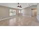 Bright and airy living room with tile floors and lots of natural light at 6174 Alloway St, Englewood, FL 34224