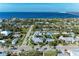 Aerial view of house and neighborhood near the water at 668 W Olympia Ave, Punta Gorda, FL 33950