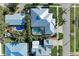 Aerial view of house and pool in a neighborhood at 668 W Olympia Ave, Punta Gorda, FL 33950