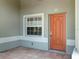 Front door entrance with tiled porch at 81 Michigan Ave, Englewood, FL 34223