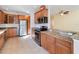 Kitchen with stainless steel appliances and granite countertops at 81 Michigan Ave, Englewood, FL 34223