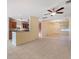 Bright living room with tile flooring and ceiling fan at 81 Michigan Ave, Englewood, FL 34223