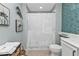 Bathroom with shower, white vanity, and tile at 900 E Marion Ave # 1301, Punta Gorda, FL 33950