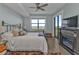 Main bedroom with fireplace and water views at 900 E Marion Ave # 1301, Punta Gorda, FL 33950