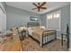 Bedroom with ceiling fan and wooden floors at 900 E Marion Ave # 1301, Punta Gorda, FL 33950