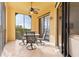 Covered lanai with table and chairs, perfect for dining at 98 Vivante Blvd # 98317, Punta Gorda, FL 33950