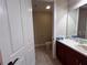 Guest bathroom with toilet and sink at 99 Vivante Blvd # 415, Punta Gorda, FL 33950