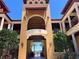 Elegant building exterior with arched entryway at 99 Vivante Blvd # 415, Punta Gorda, FL 33950