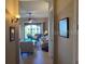 Bright hallway offering a view into the living room at 99 Vivante Blvd # 415, Punta Gorda, FL 33950