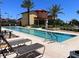 Relaxing pool with plenty of lounge chairs at 99 Vivante Blvd # 415, Punta Gorda, FL 33950