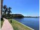 Peaceful walkway along the lake, offering scenic views at 99 Vivante Blvd # 415, Punta Gorda, FL 33950