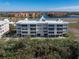 Waterfront building with balconies and tennis court at 101 N Marion Ct # 114, Punta Gorda, FL 33950