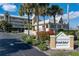 Community entrance with landscaping and Points West Harborfront signage at 101 N Marion Ct # 114, Punta Gorda, FL 33950