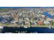 Aerial view of waterfront home in a residential community at 1023 San Mateo Dr, Punta Gorda, FL 33950