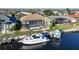 Aerial view of waterfront home with private boat dock at 1023 San Mateo Dr, Punta Gorda, FL 33950